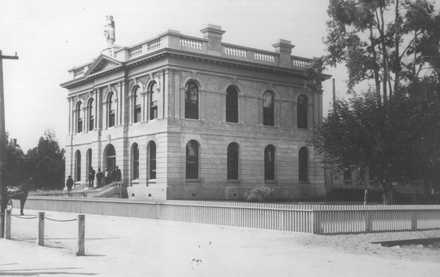 Archival exterior photo of second county courthouse of San Mateo County