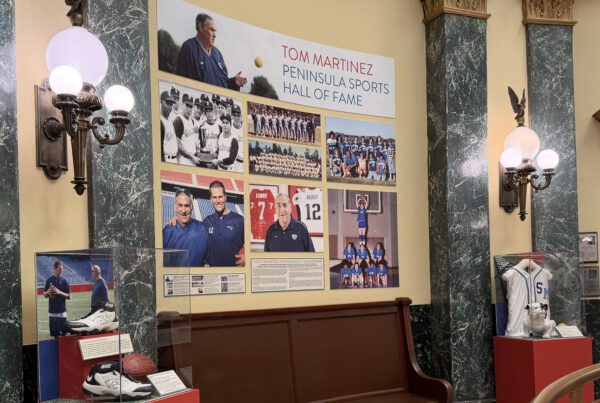 Tom Martinez exhibit featuring photographs and memorabilia