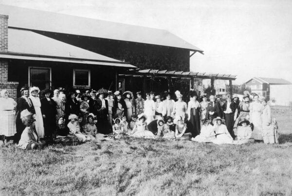 Women gathered in front of club building in 1911