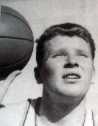 A young John Madden in a high school photograph of him playing basketball