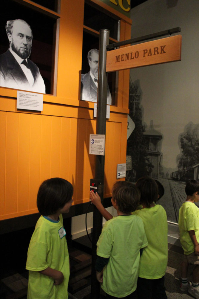 Students view the exhibit Journey to Work as part of Getting from Here to There school program at the San Mateo County History Museum