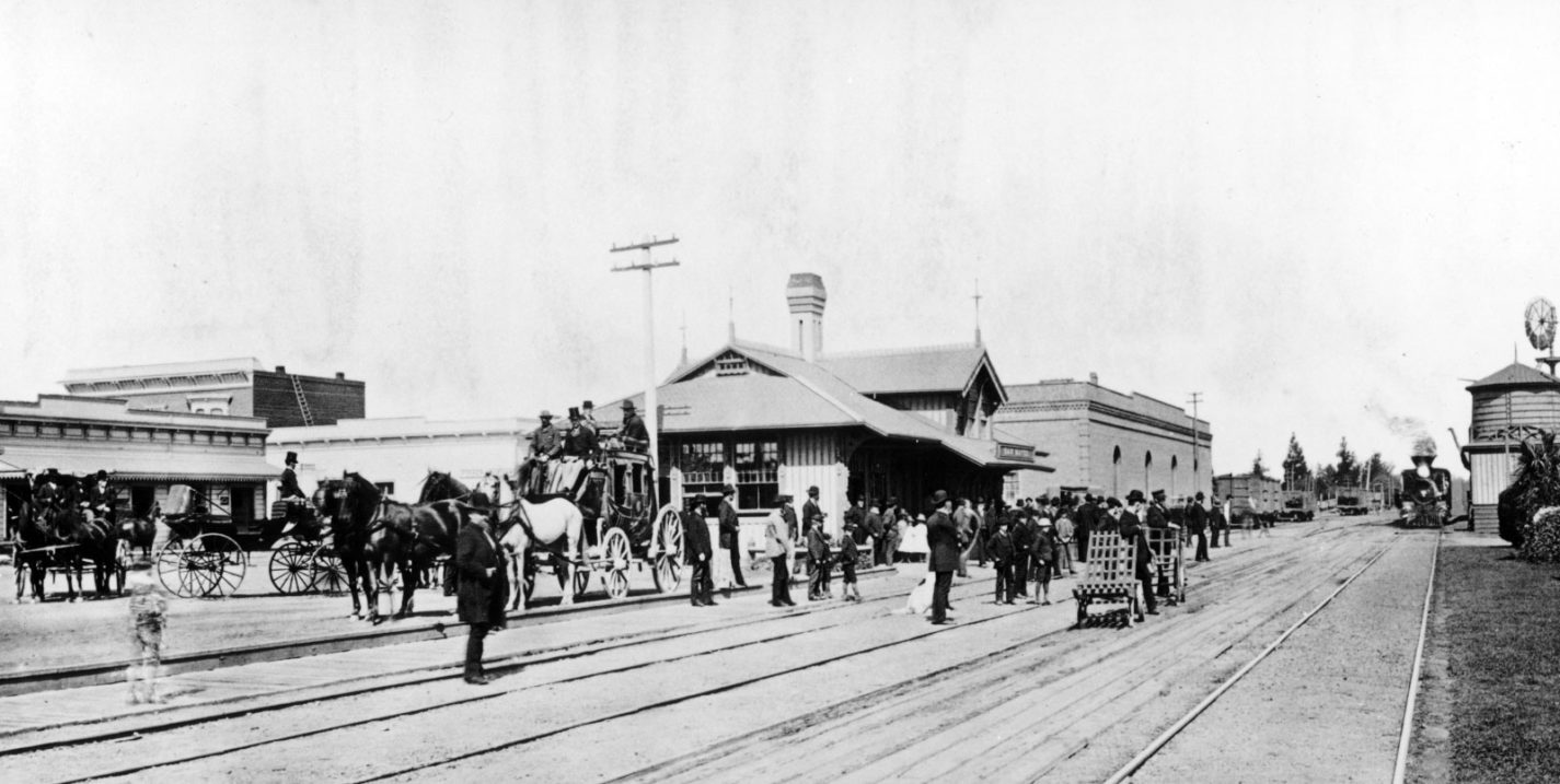 Archival photo of people waiting for train at San Mateo station