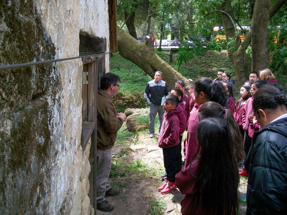 Students at the Folger Stable school program listen to a docent