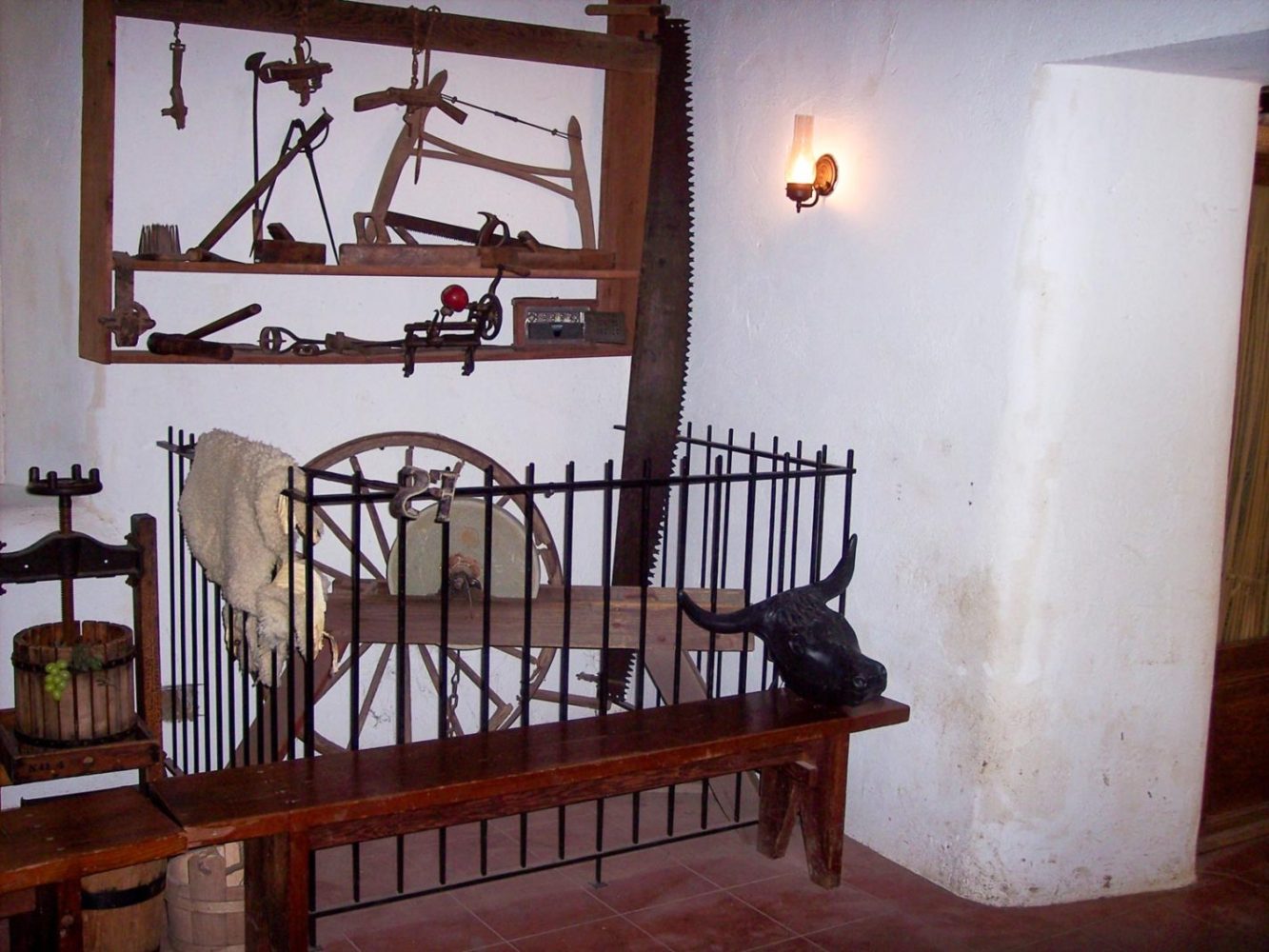 Interior of Sanchez Adobe in Woodside with period tools from 1800s