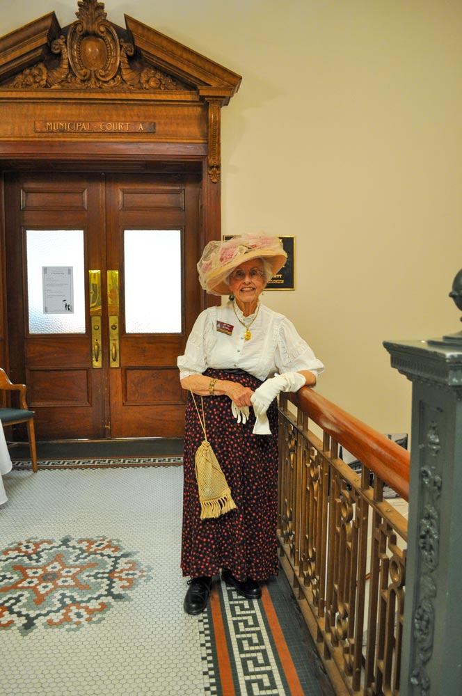 An older woman dressed in Victorian dress at San Mateo County History Museum