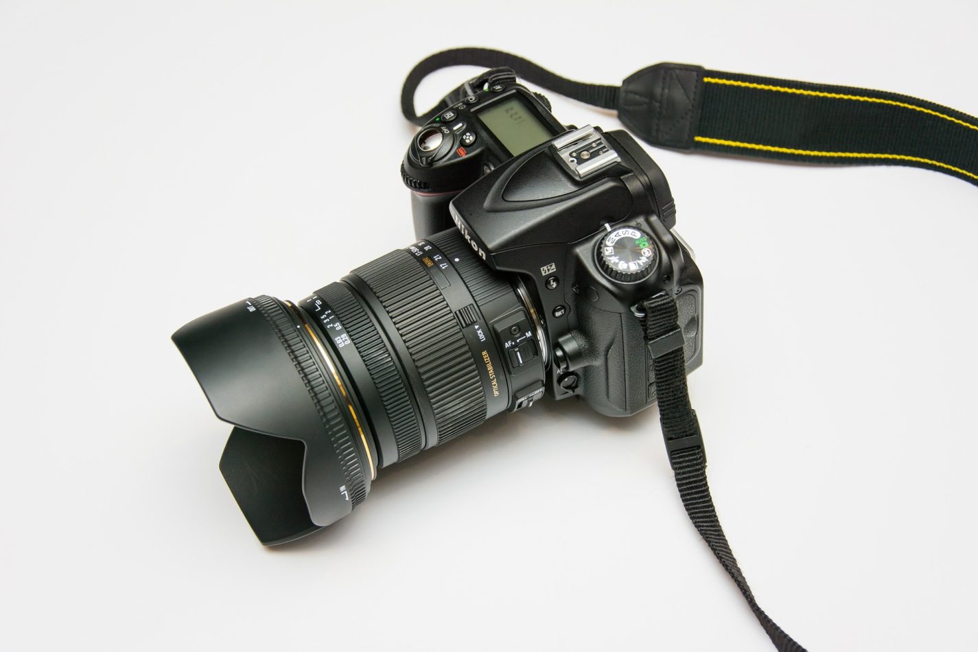 camera with long lens and strap