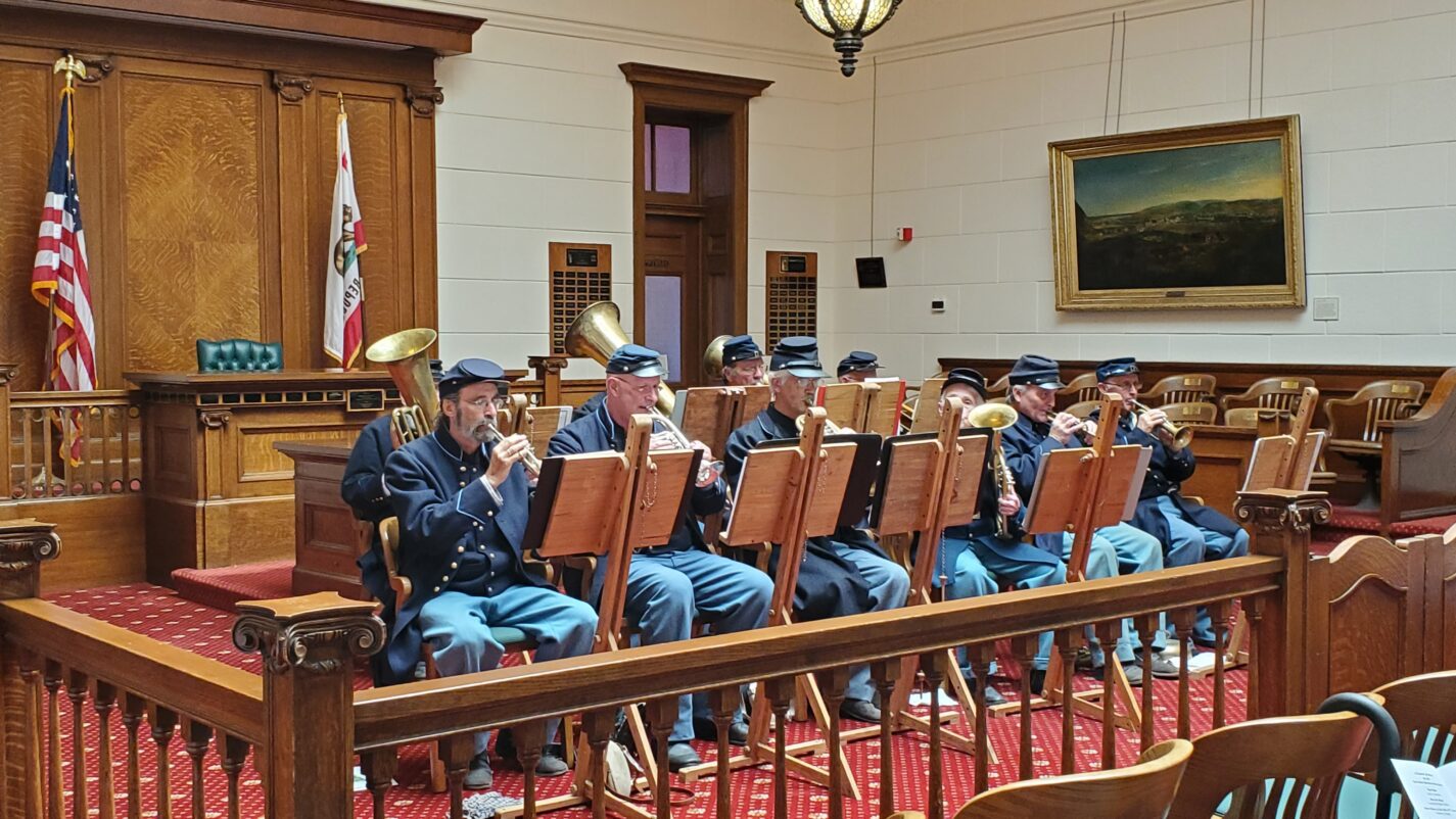 Fort Point Garrison Brass Band performing in Courtroom A