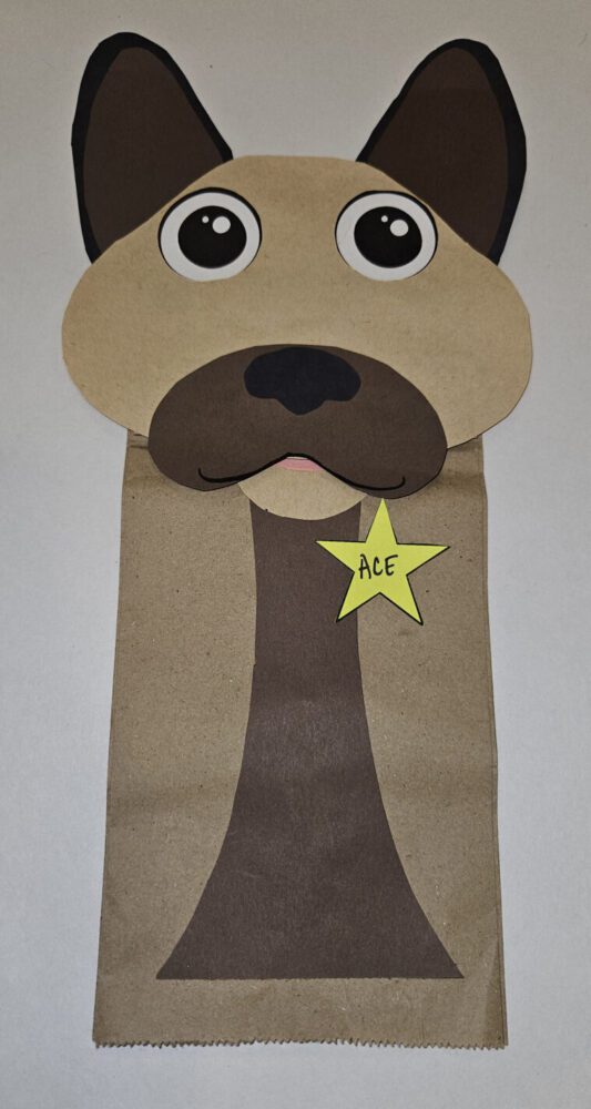 Dog puppet with star made out of a paper bag