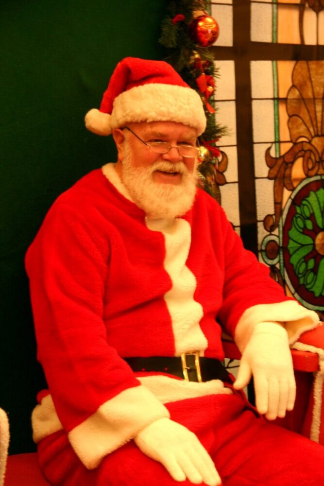 Santa sitting on a chair